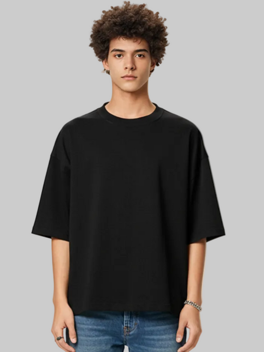 Aero boxy crop tee in black by Apollo Moda, worn by model against a plain background