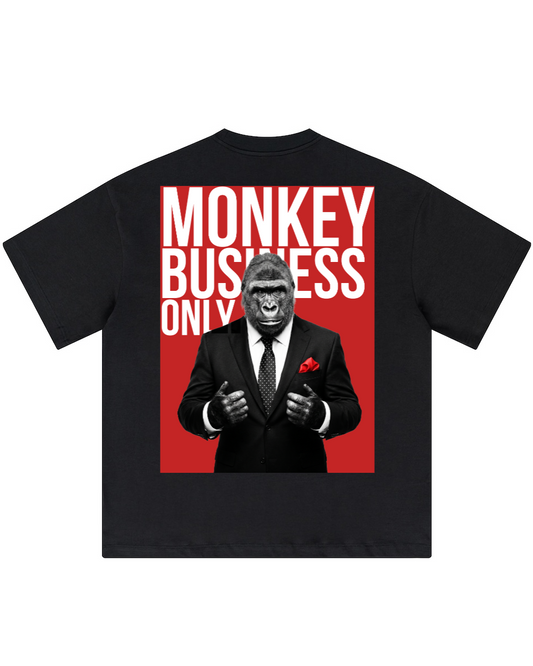 Black t-shirt with a graphic of a monkey in a suit and red text on a white background