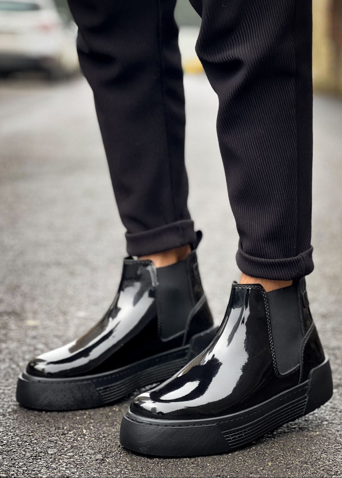 Avalon Patent Onyx Chelsea boot in black patent by Apollo Moda, worn with black trousers
