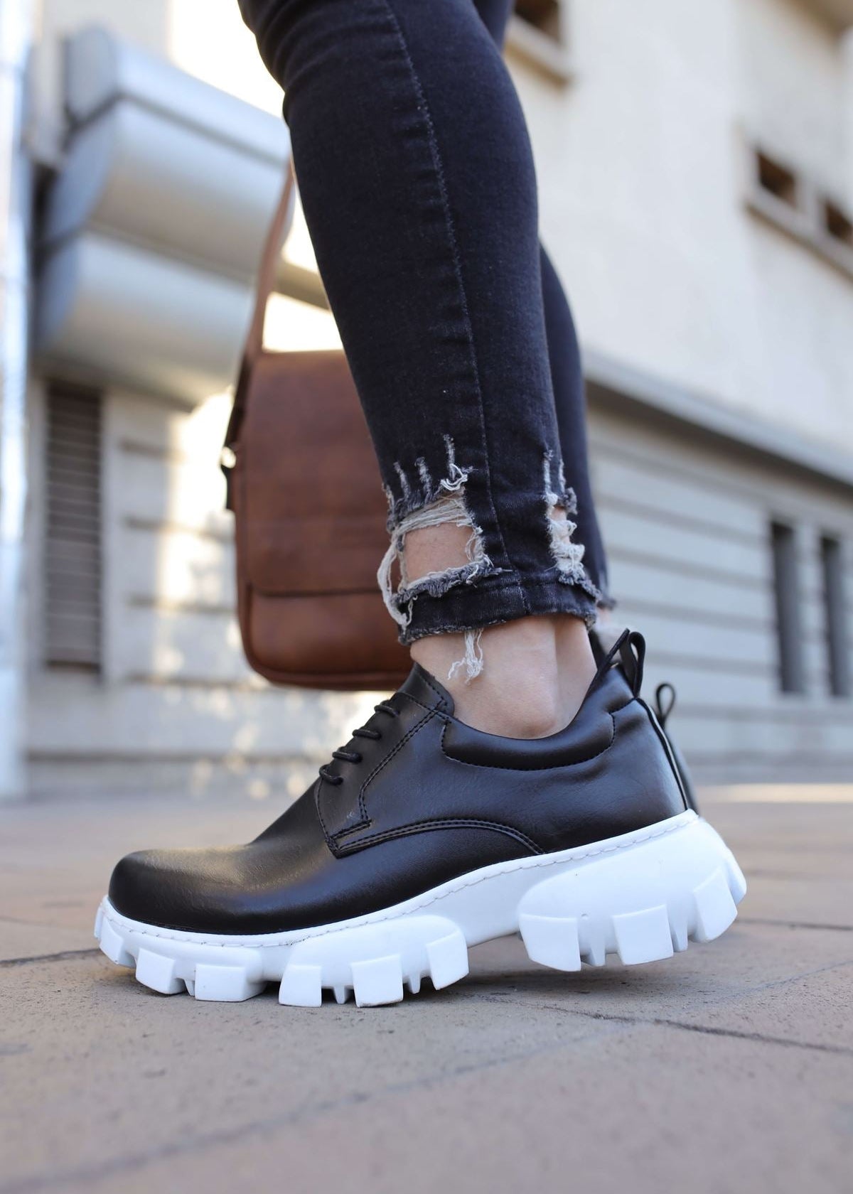 Cancun casual sneaker in black and white by Apollo Moda, view 3