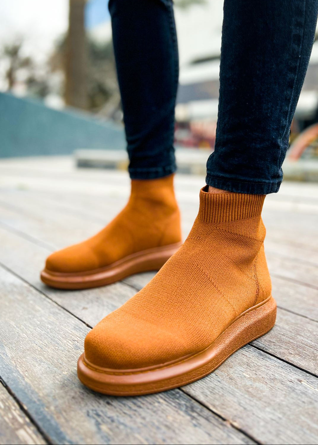 Torino X Espresso Essence knit ankle boot in light brown by Apollo Moda, on a wooden surface